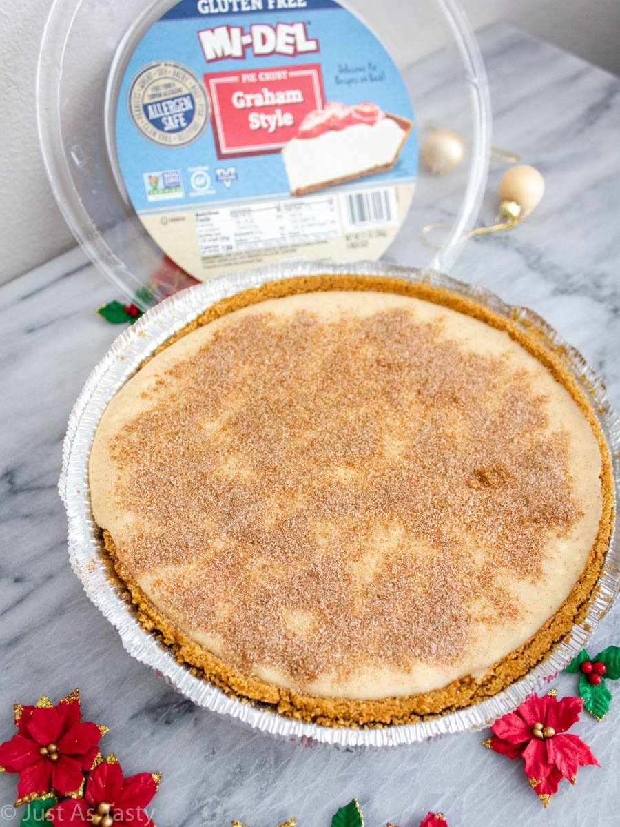 Snickerdoodle cheesecake on a marble surface.