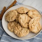 Glazed cookies on a white plate.