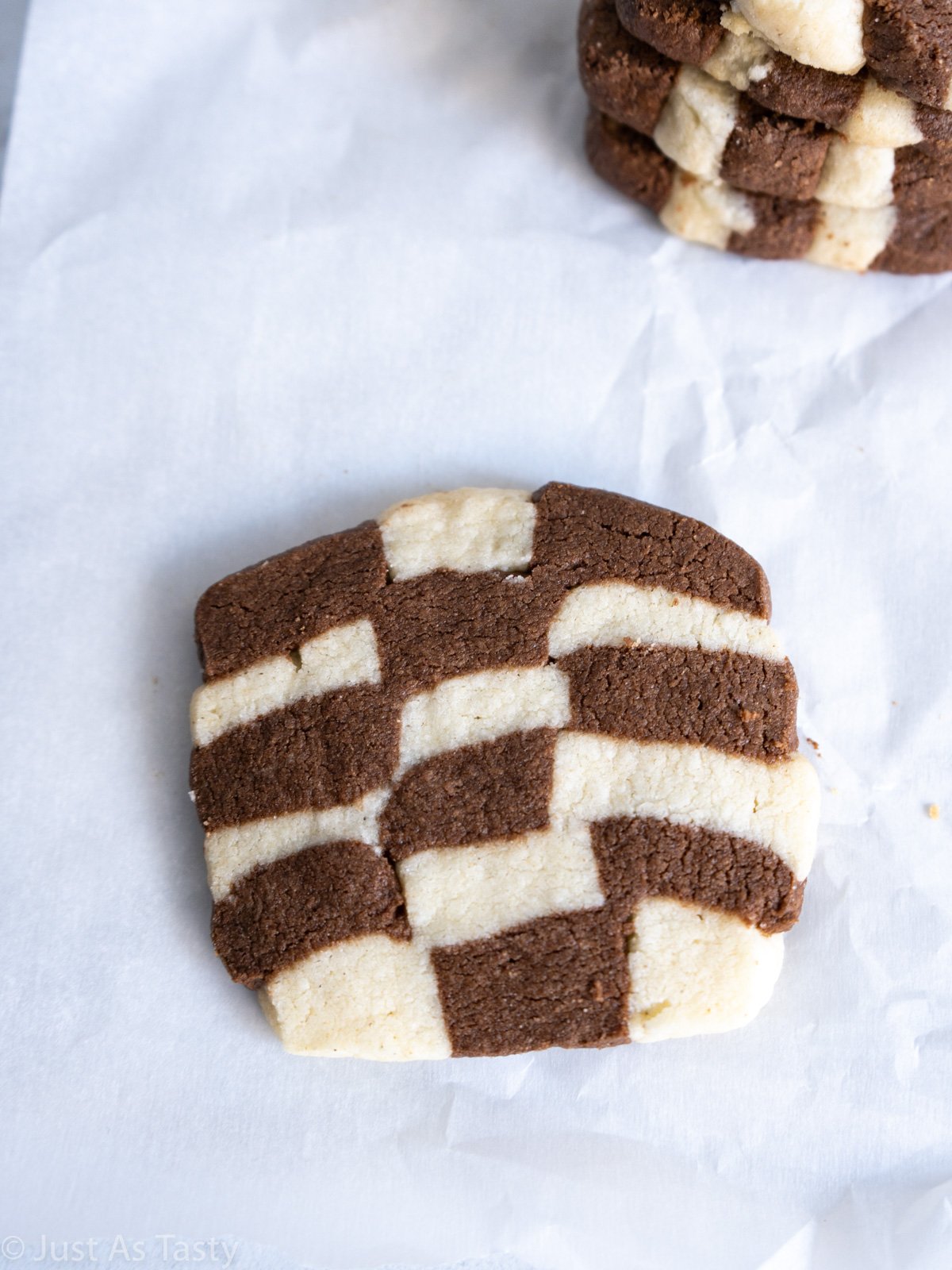 Close-up of a chocolate and vanilla checkered cookie.