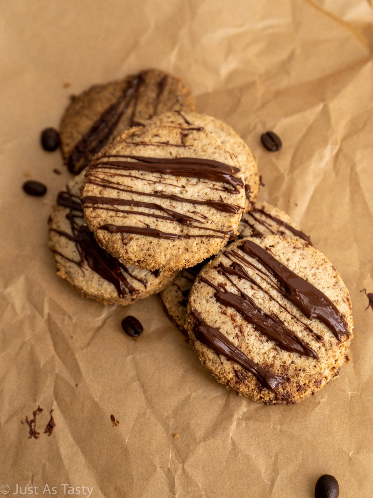 Espresso shortbread cookies topped with melted chocolate drizzle. 