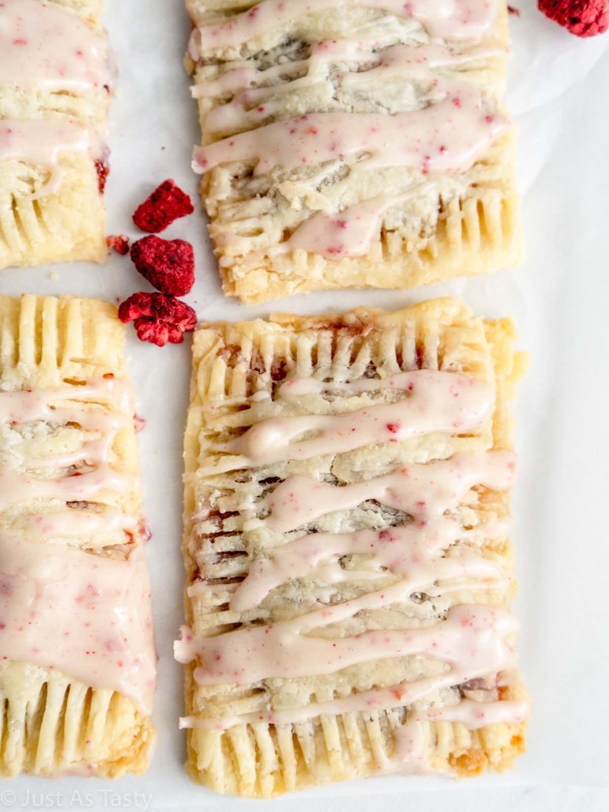 Close-up of a glazed raspberry pop tart.