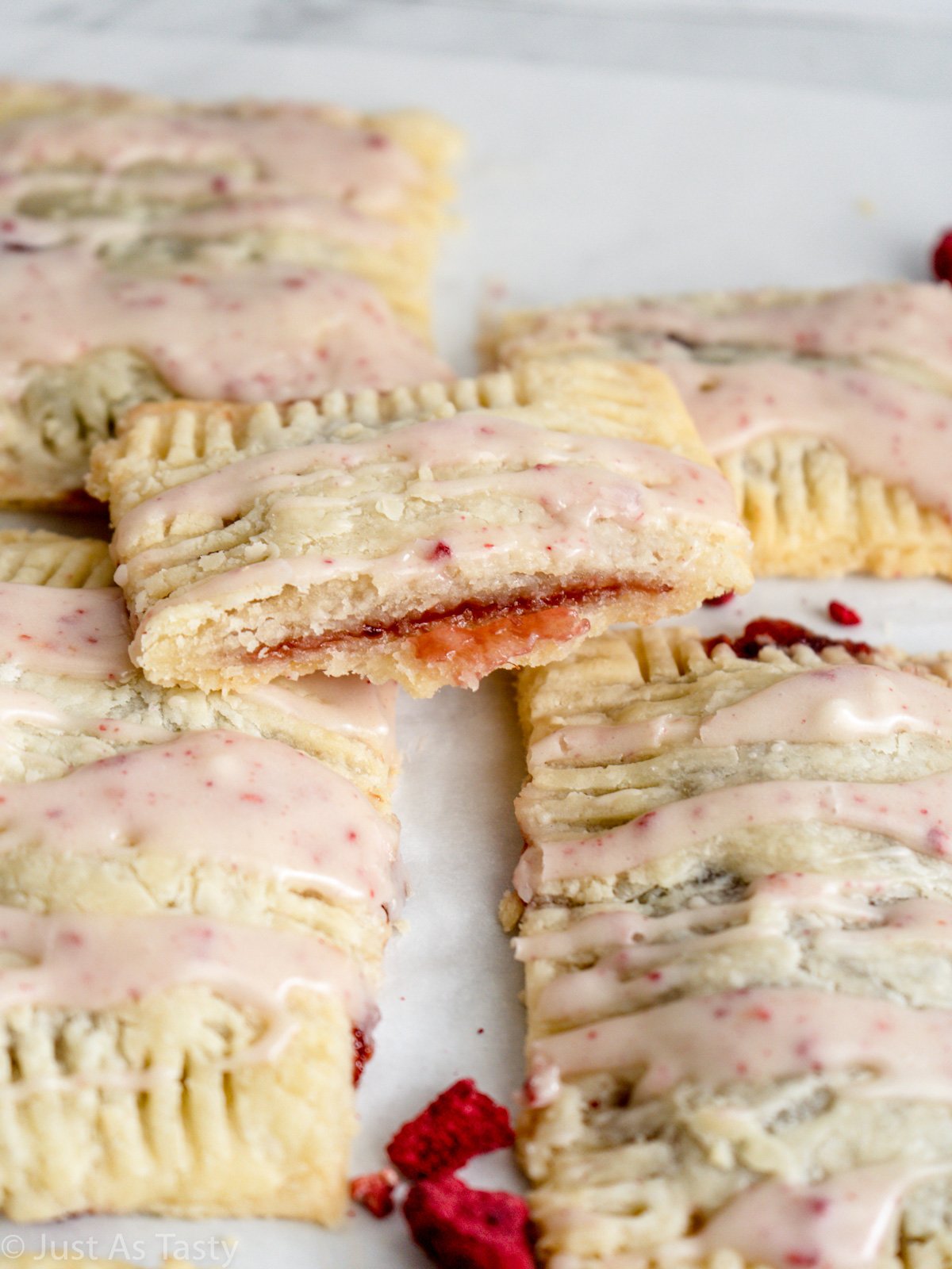 Raspberry pop tart cut in half.