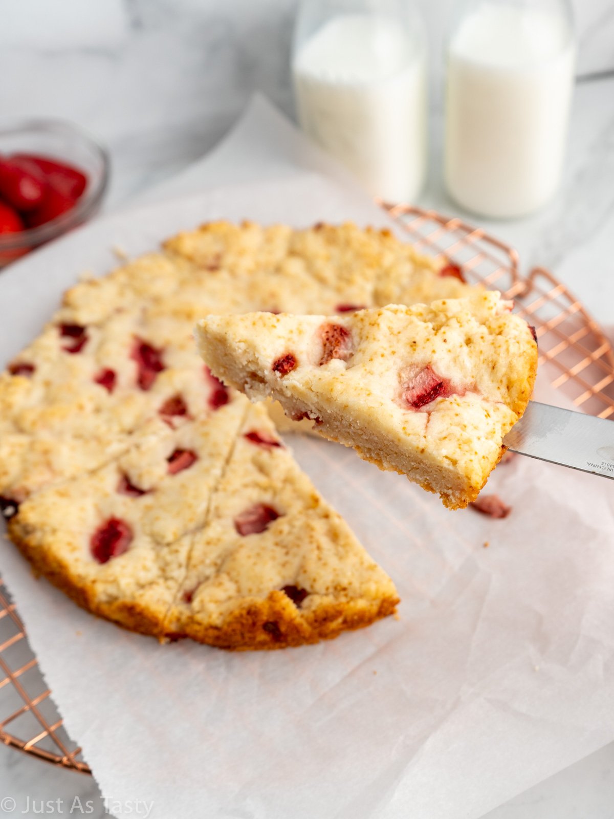 Close-up of a sliced strawberry cake.