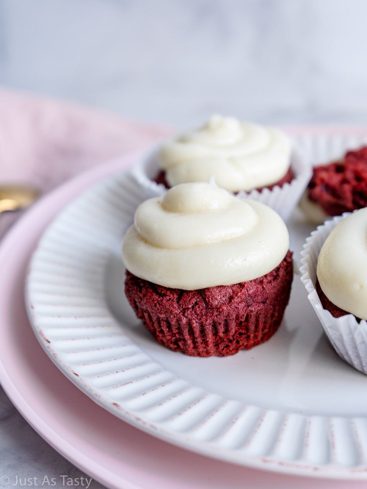 Close-up of a frosted red velvet cupcake. 