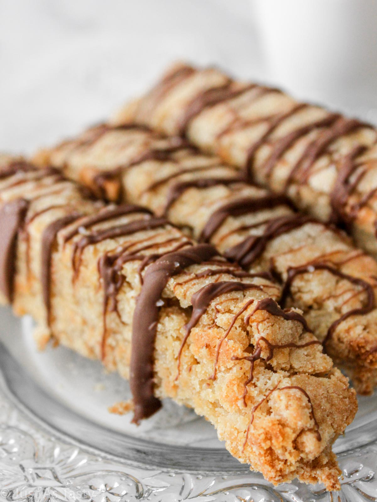 Close-up of biscotti on a glass plate.