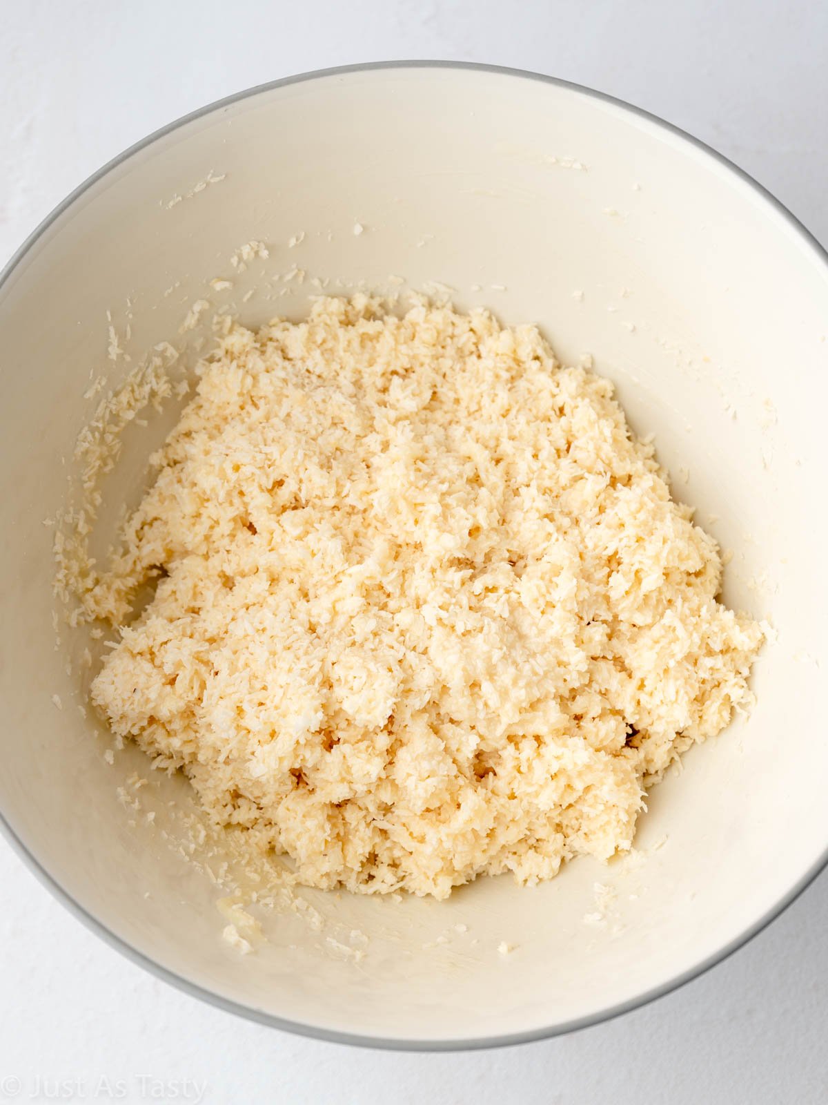 Coconut macaroon mixture in a bowl.