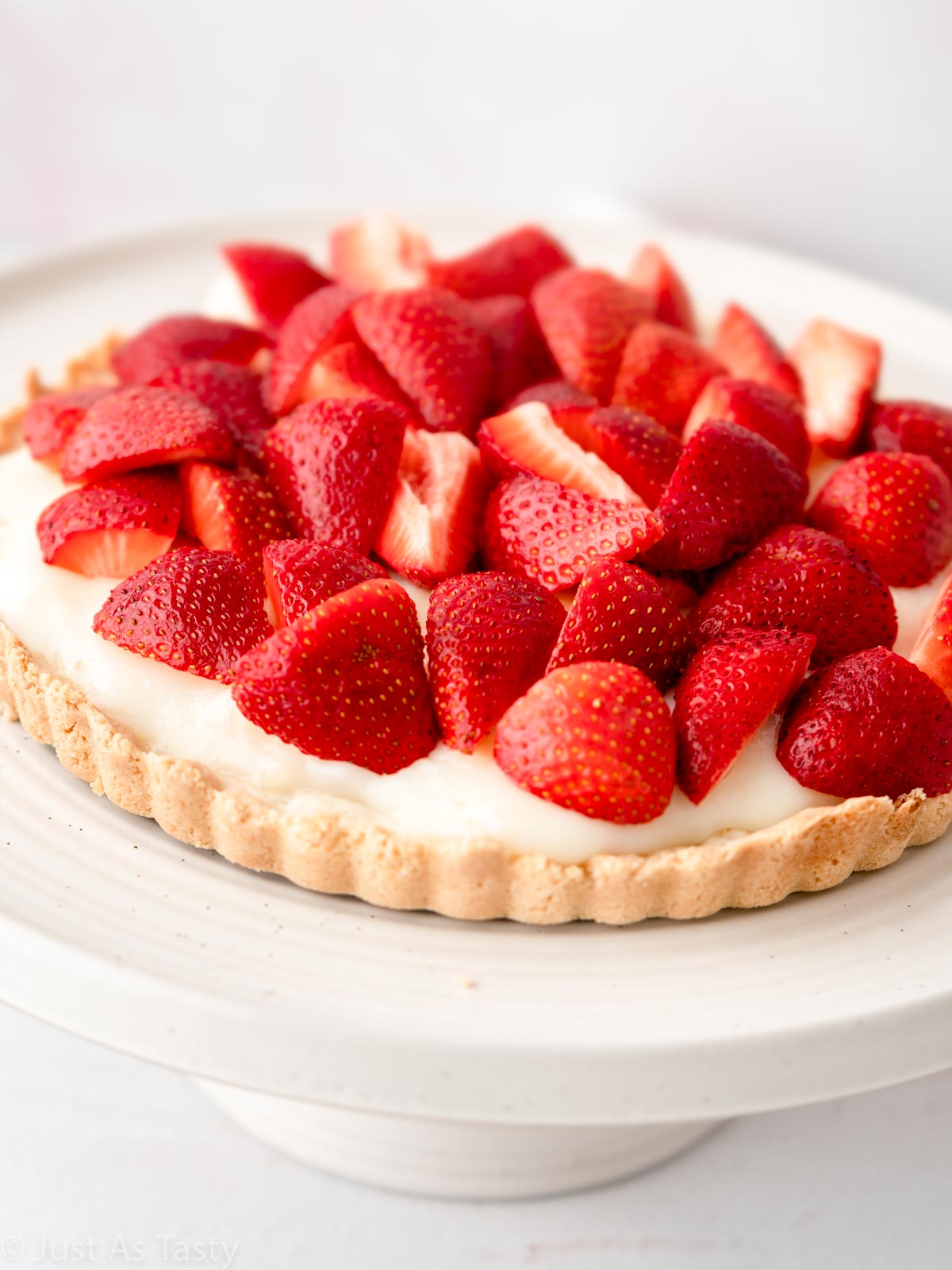 Close-up of a strawberry custard tart. 