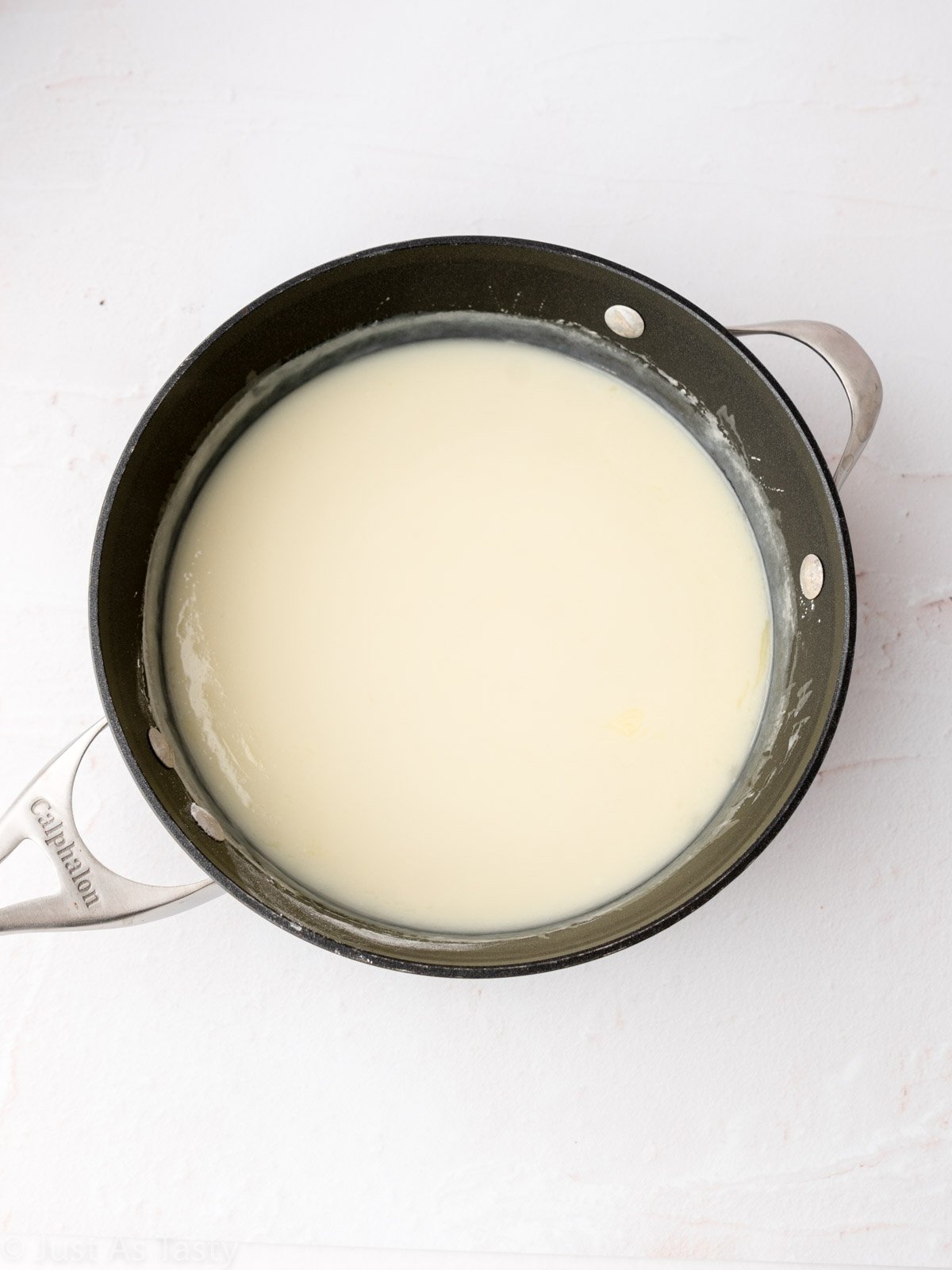 Custard filling in a saucepan.