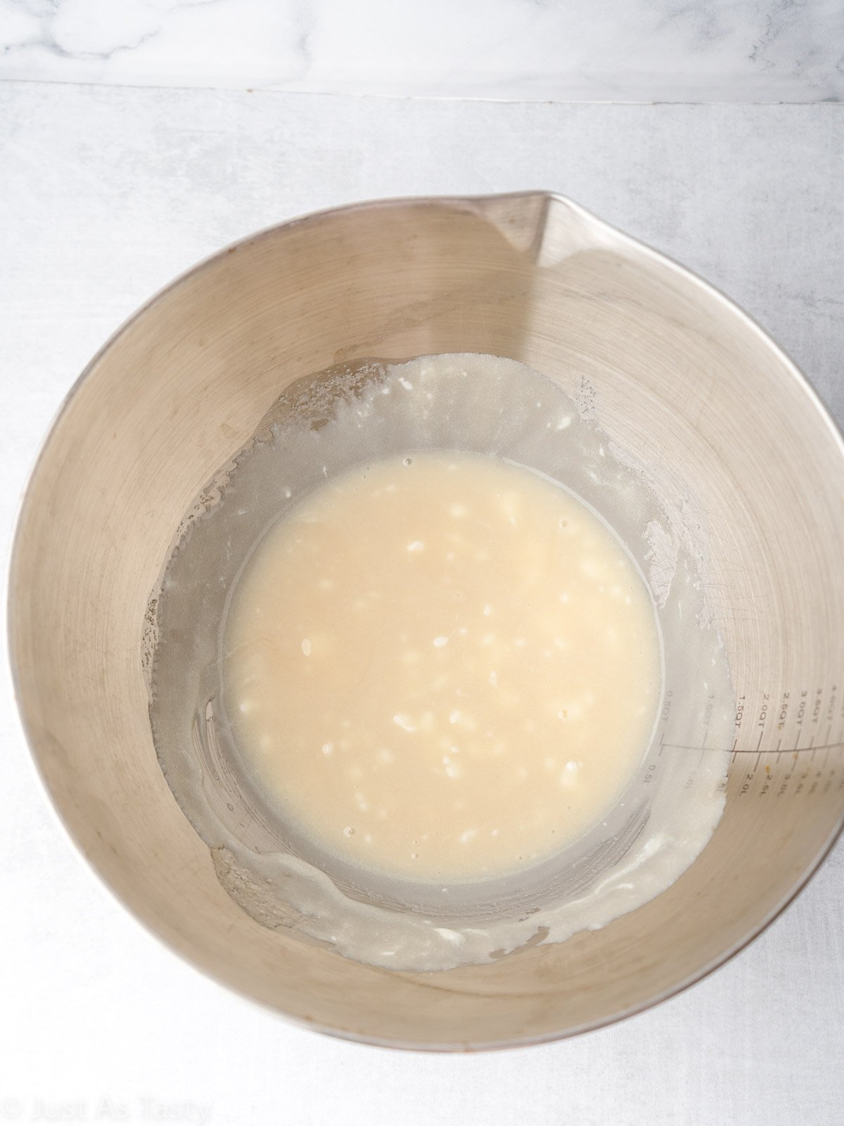 Wet ingredients in a mixing bowl.