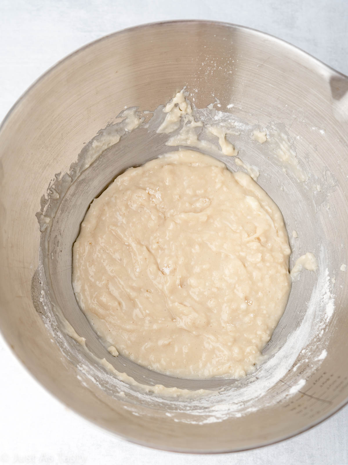 Tres leches cake batter in a mixing bowl.