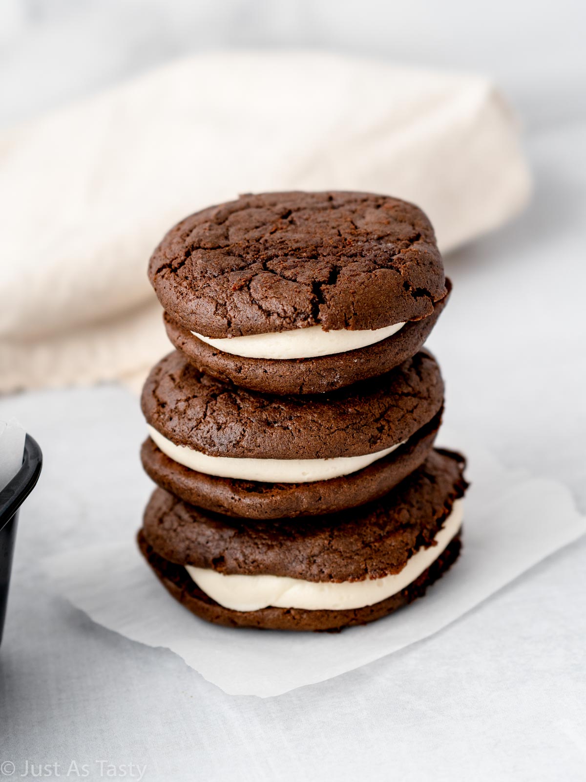 Stack of three chocolate whoopie pies.