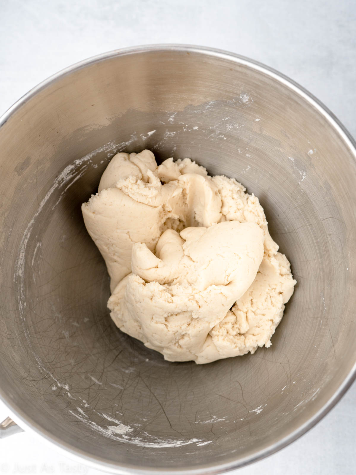 Cinnamon roll dough in a bowl.