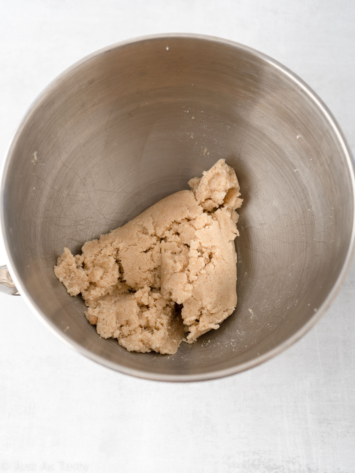 Creamed butter and sugar in a bowl.