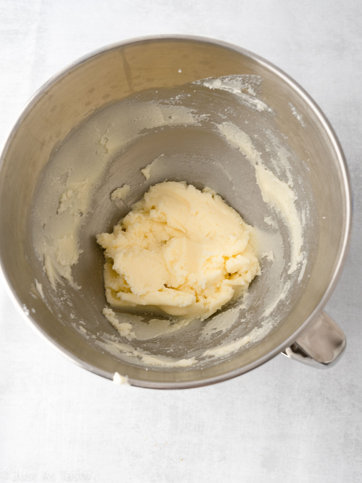 Creamed butter and sugar in a bowl.