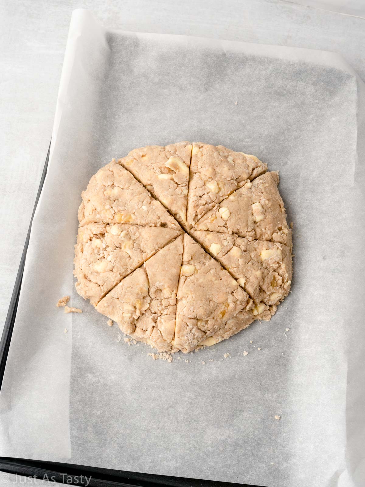 Scone dough on a baking sheet. 