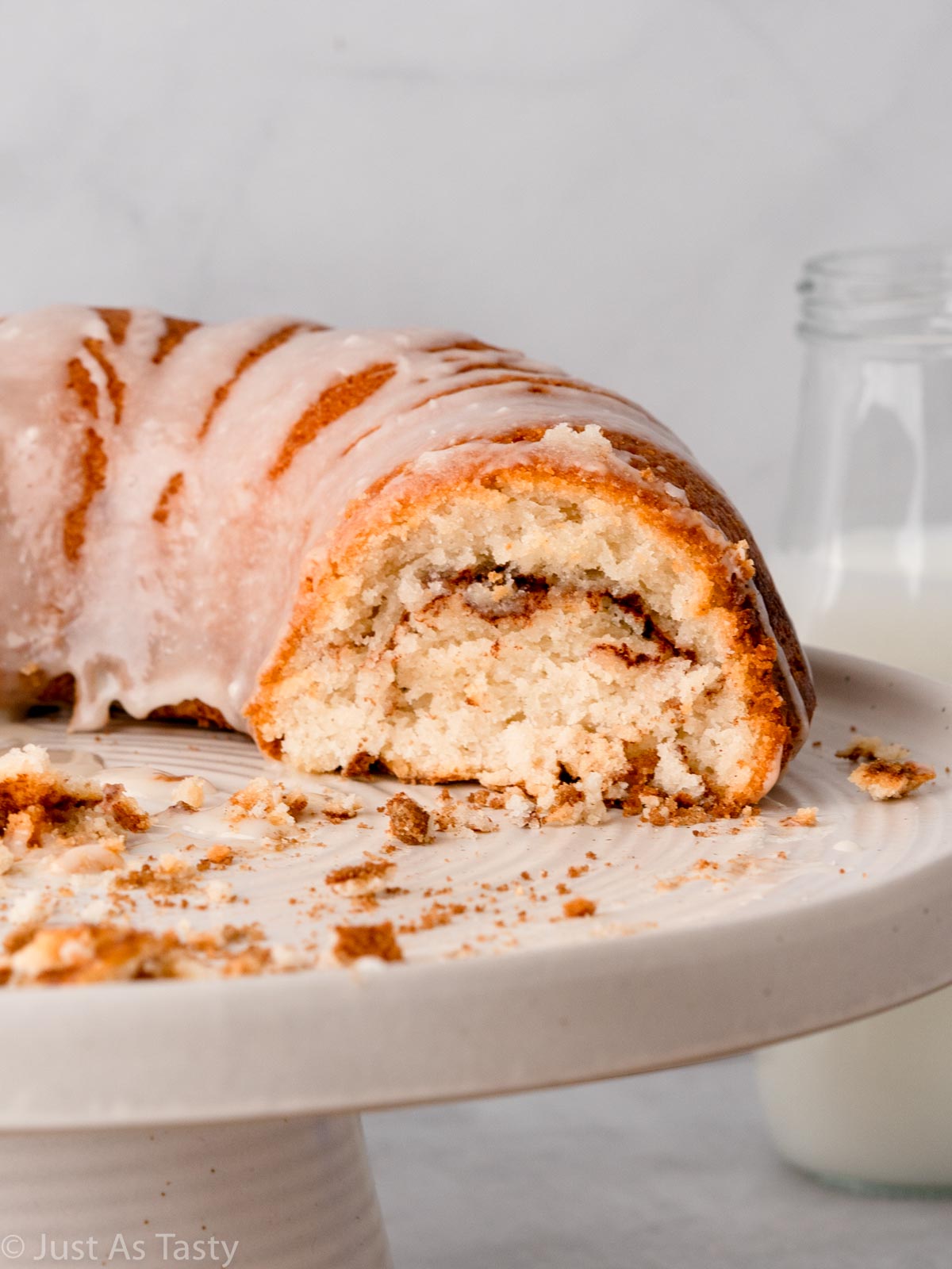 Close-up of sliced cinnamon roll bundt cake.