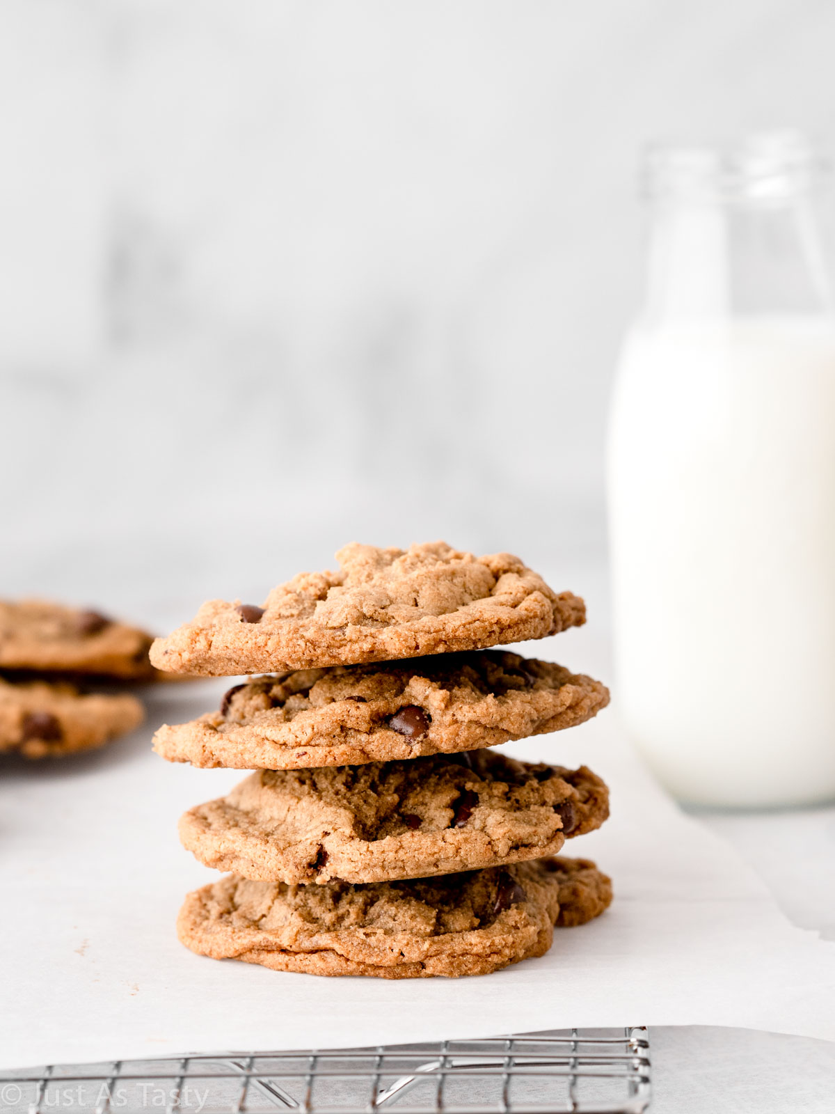 Stack of four espresso chocolate chip cookies.