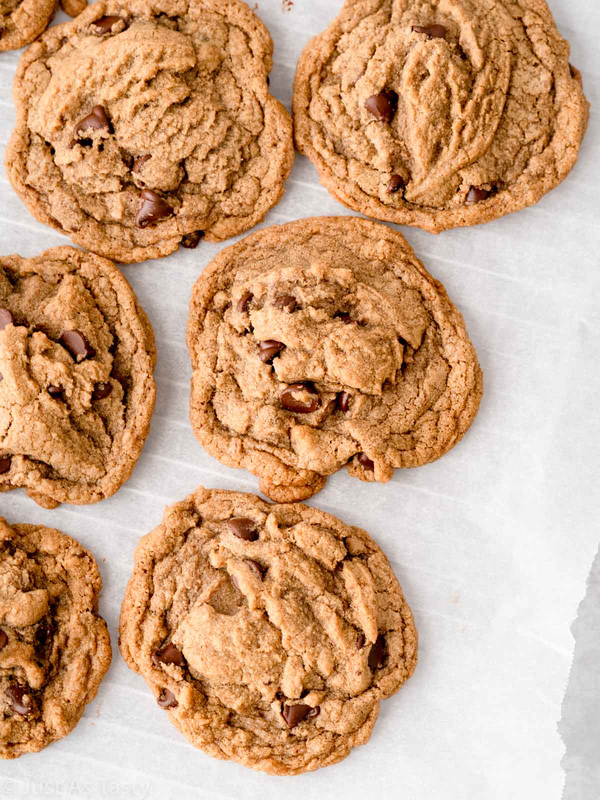 Espresso chocolate chip cookies on parchment paper. 