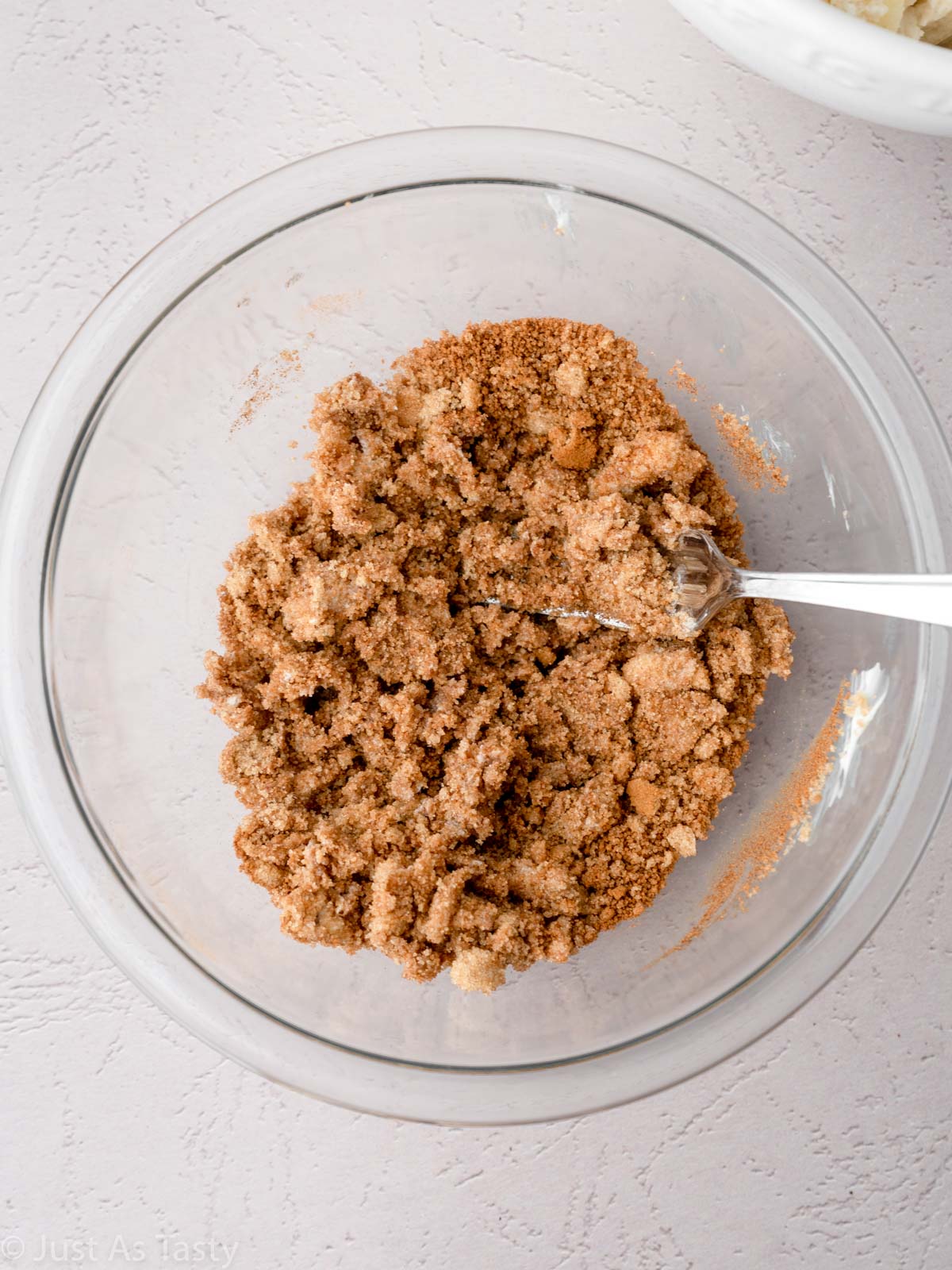 Cinnamon crumble topping in a bowl.