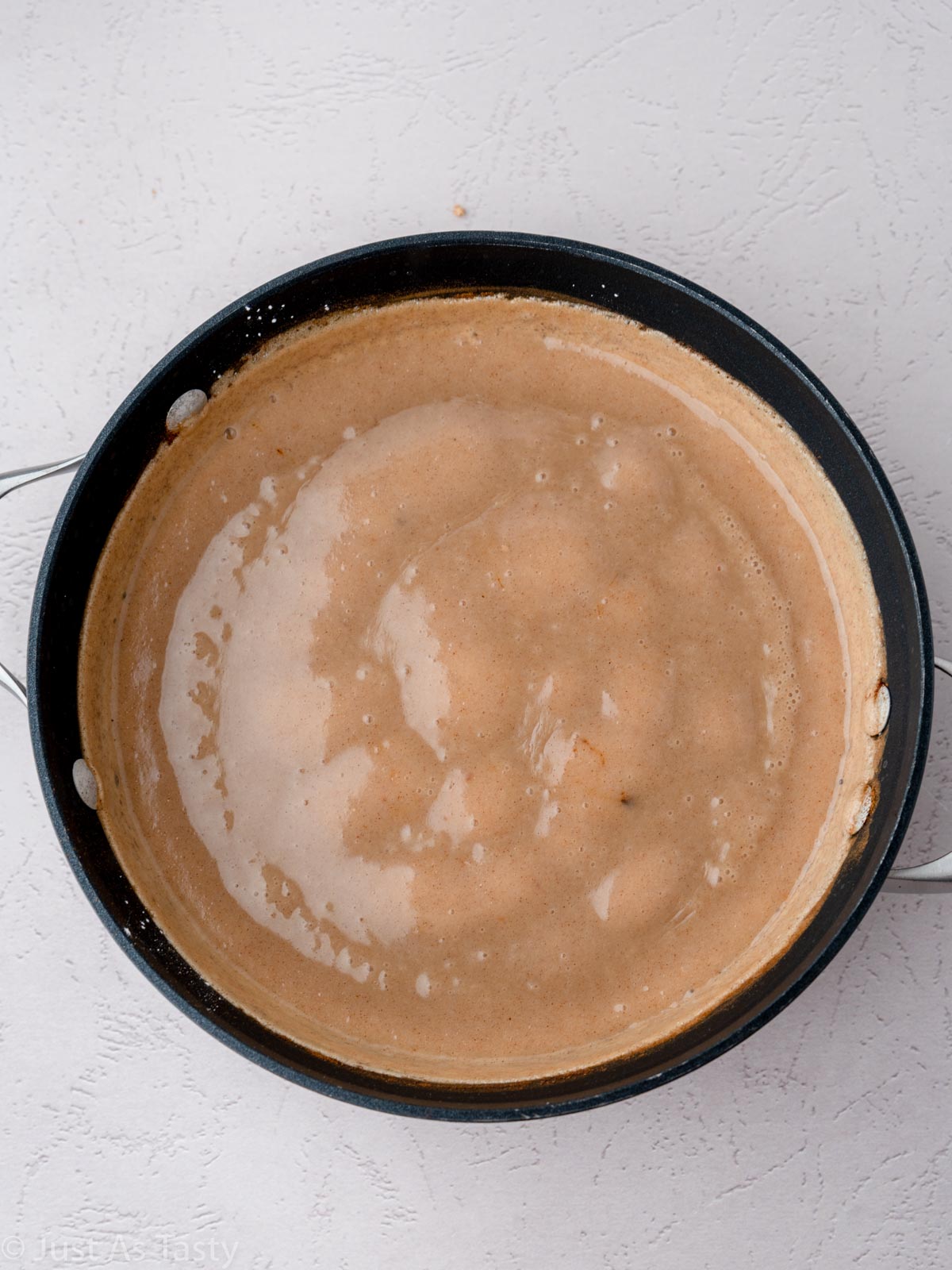 Butterscotch pie filling in a saucepan.