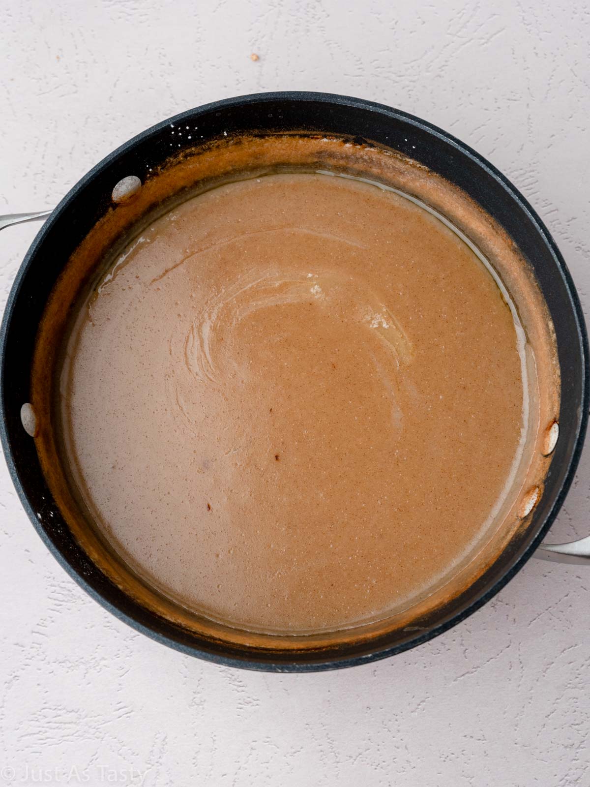 Butterscotch pie filling in a saucepan.