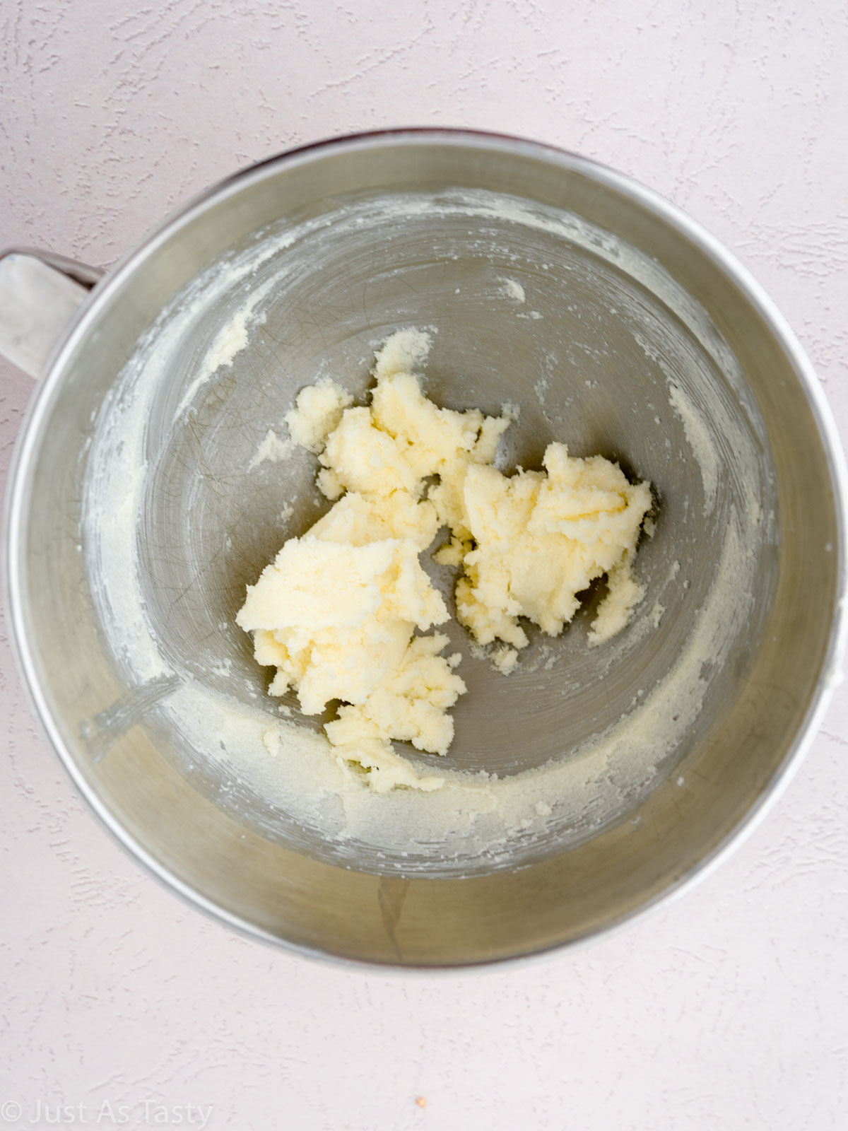 Creamed butter and sugar in a bowl.