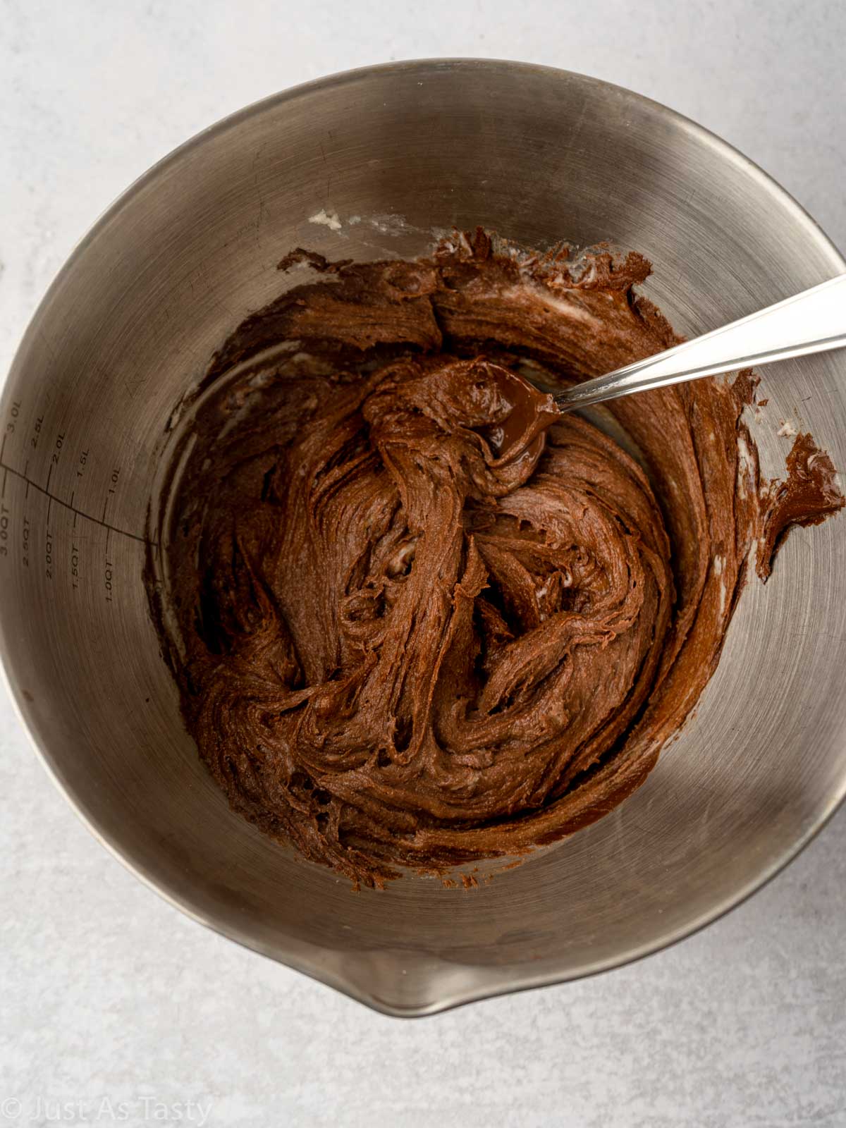 Chocolate cake batter in a bowl.