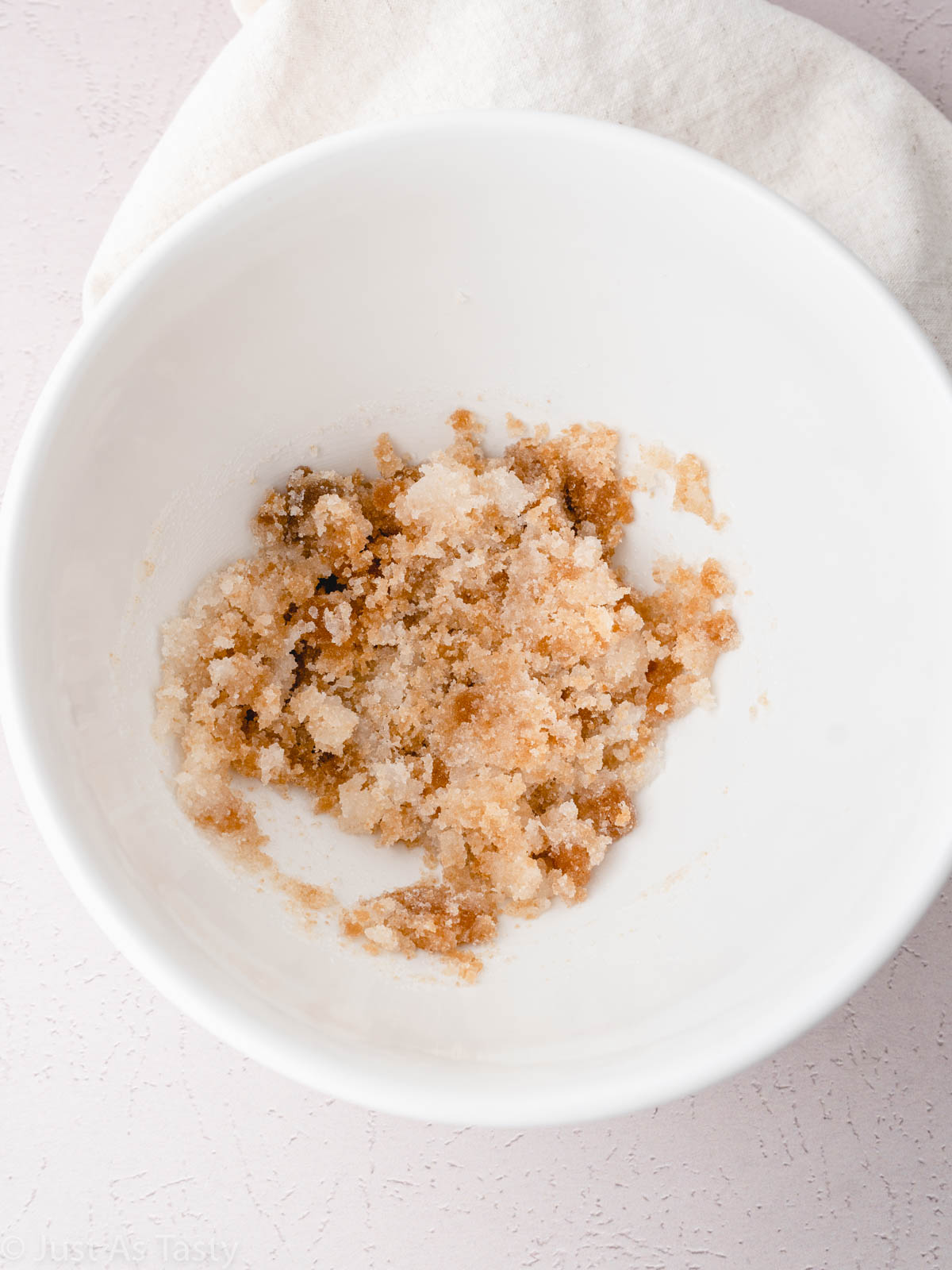Sugar and oil in a bowl.