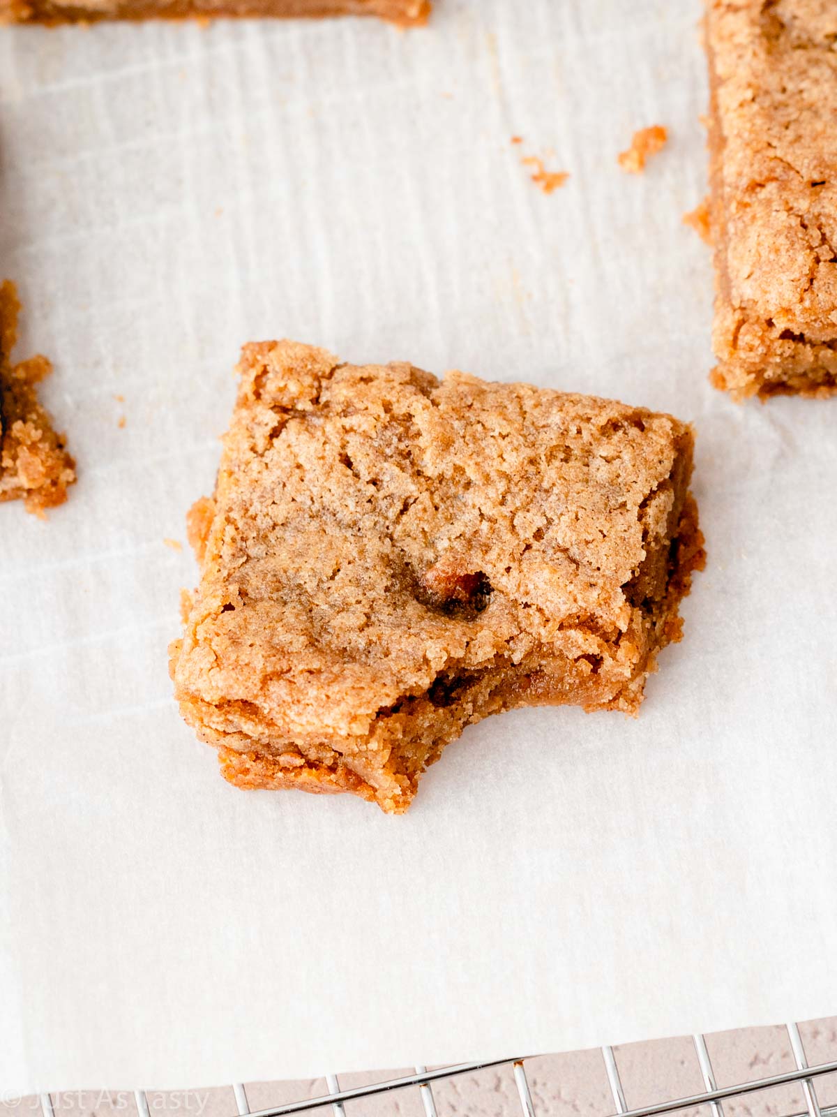 Apple blondie with a bite taken out.