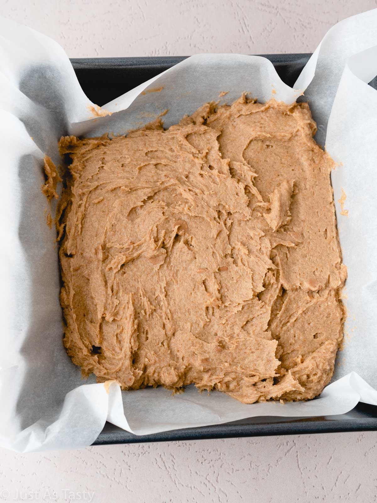Blondie batter in a square pan.