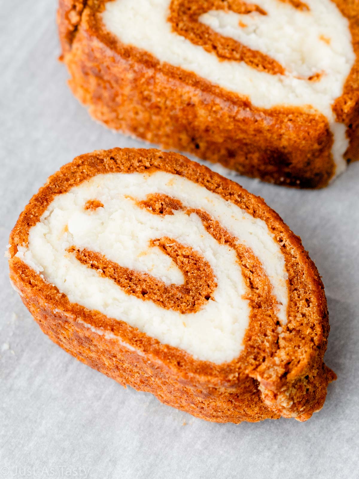 Close-up of a slice of pumpkin roll.