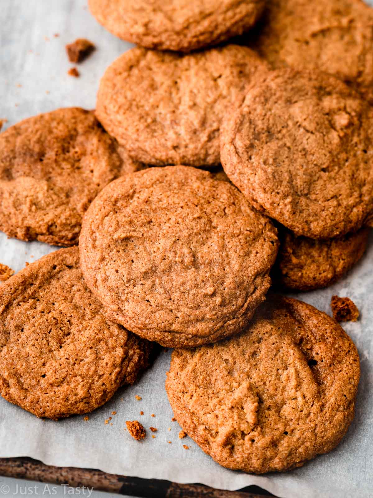 Pile of maple sugar cookies on a baking sheet.