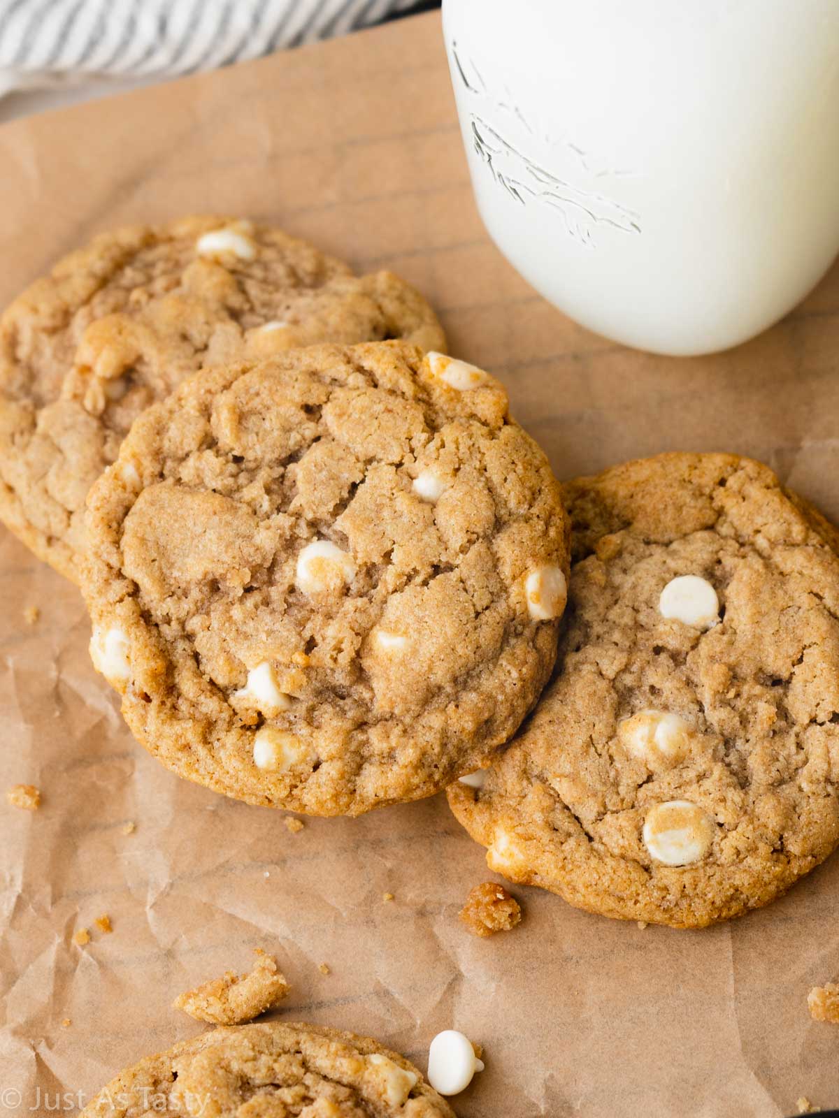 Close-up of apple pie cookies on brown parchment. 