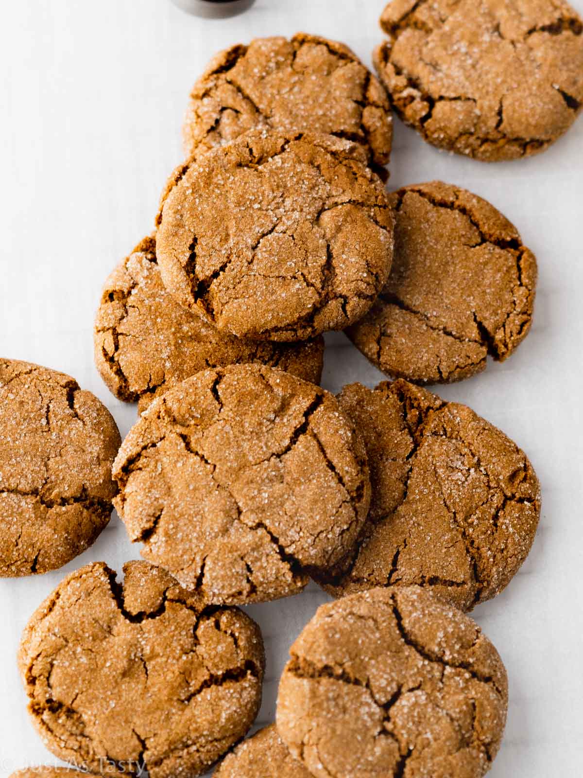 Gluten free gingersnaps on parchment paper. 