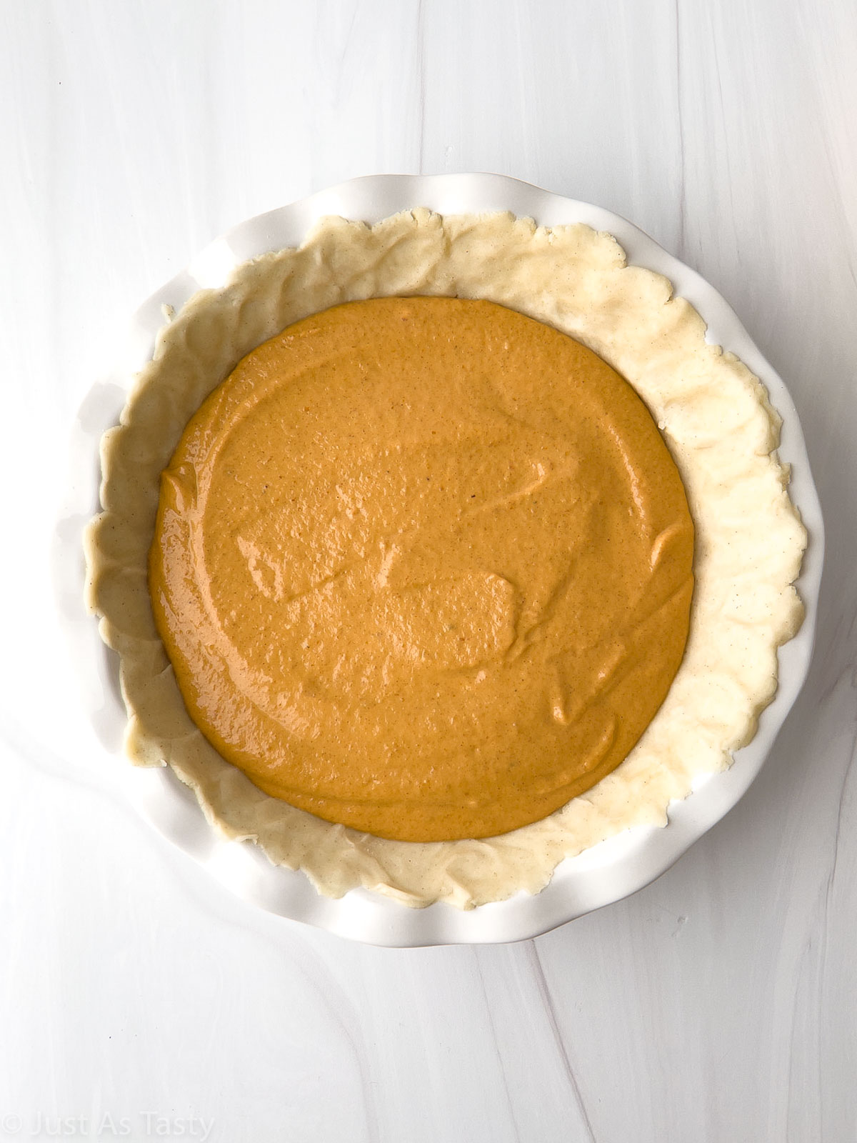 Pumpkin pie before going into the oven. 