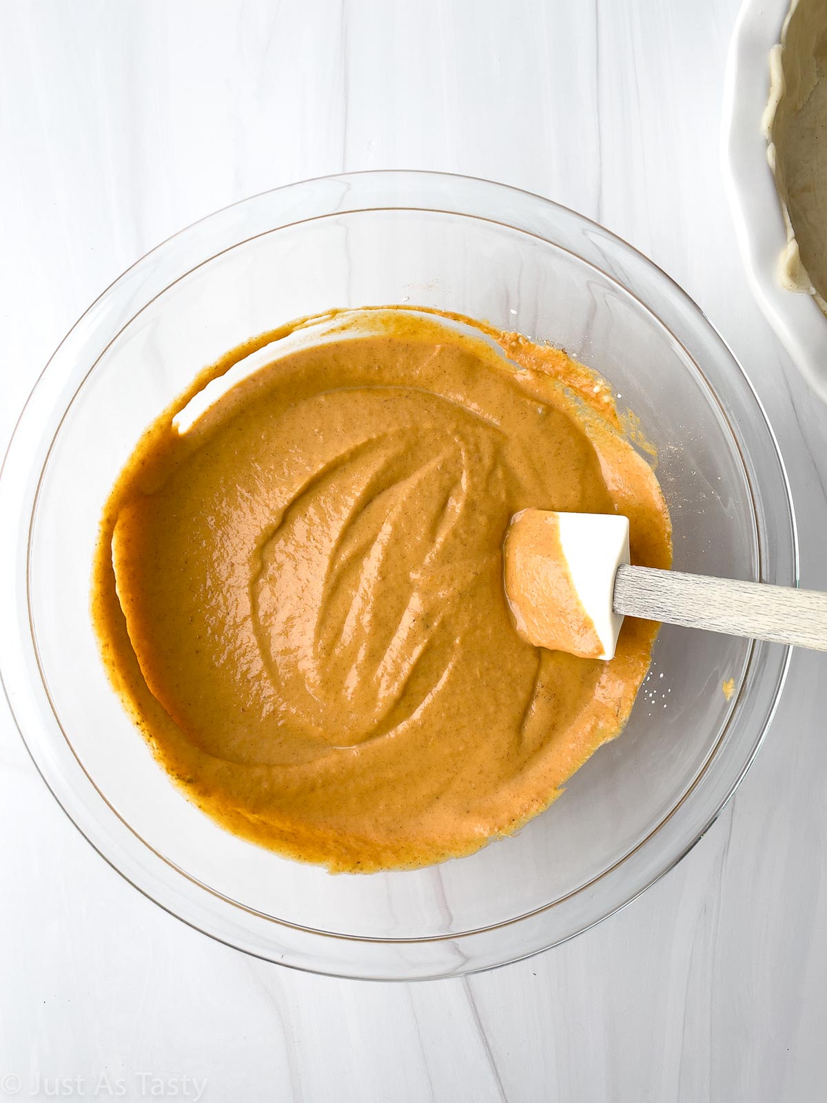 Pumpkin pie filling in a bowl.