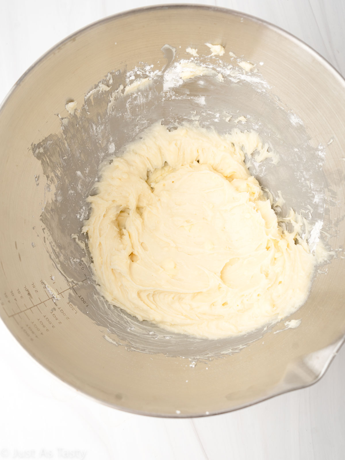 Cream cheese frosting in a mixing bowl.